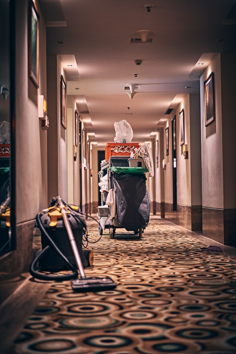 black and gray stroller on hallway